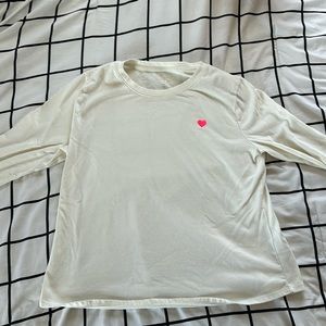 worn one time. simple white long sleeve t shirt with heart embroidered